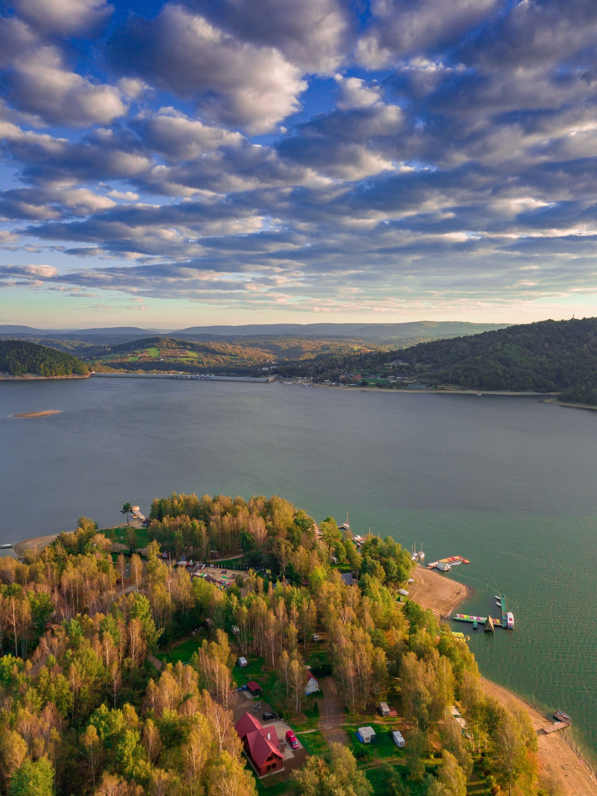 Solinskie lake in Bieszczady mountains in sunrise light. Aerial, drone photography.